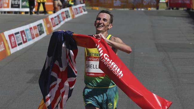 Australia's Michael Shelley celebrates after winning the Men's Marathon race in the Commonwealth Games on Gold Coast, Australia, Sunday, April 15, 2018. (AP Photo/Manish Swarup)