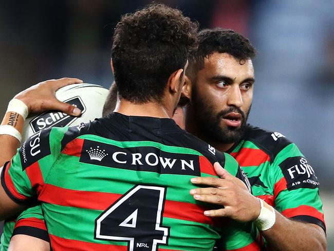 SYDNEY, AUSTRALIA - AUGUST 03: Damien Cook, Dane Gagai and Alex Johnston of the Rabbitoh celebrates victory during the round 21 NRL match between the South Sydney Rabbitohs and the Melbourne Storm at ANZ Stadium on August 3, 2018 in Sydney, Australia. (Photo by Mark Kolbe/Getty Images)