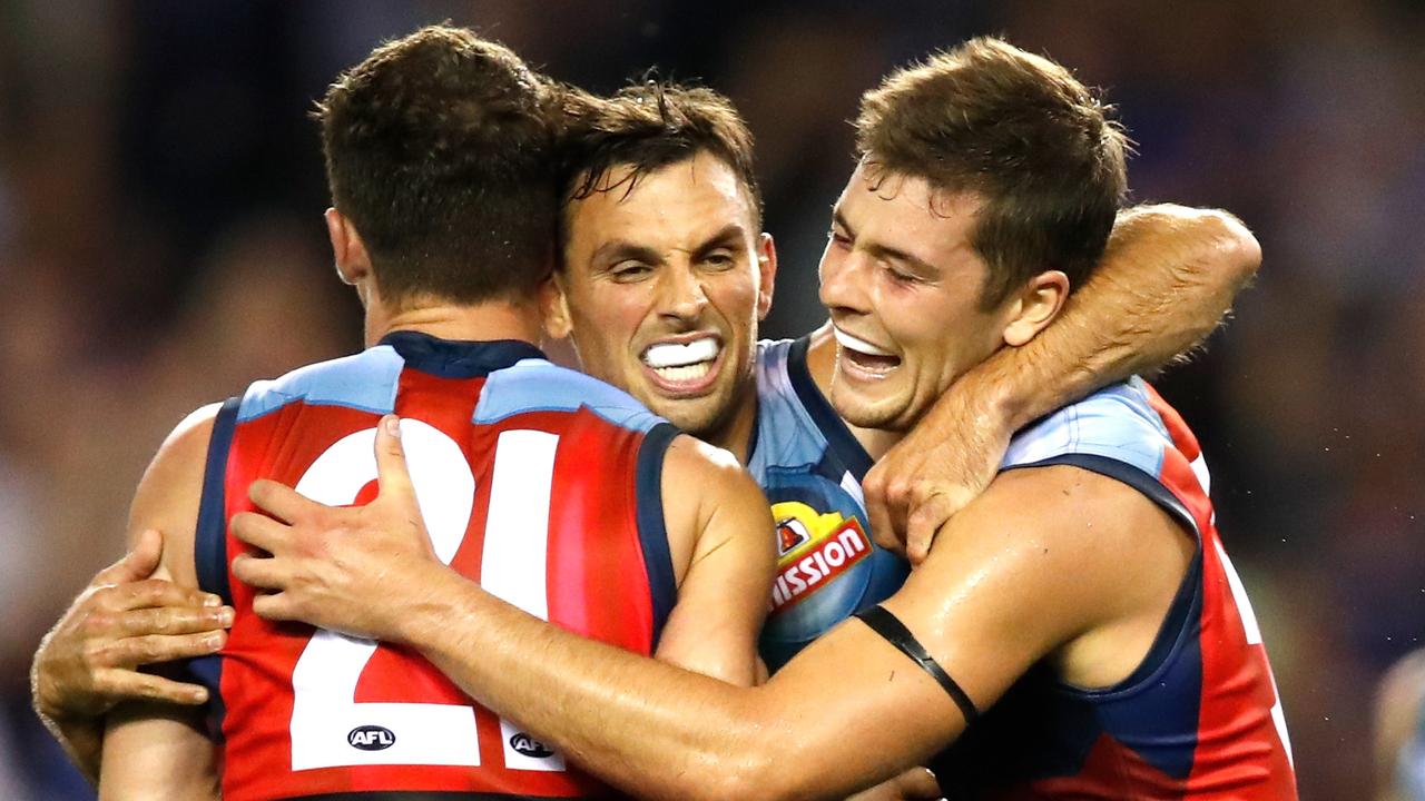 Sam Lloyd, Tom Liberatore and Josh Dunkley of the Bulldogs.