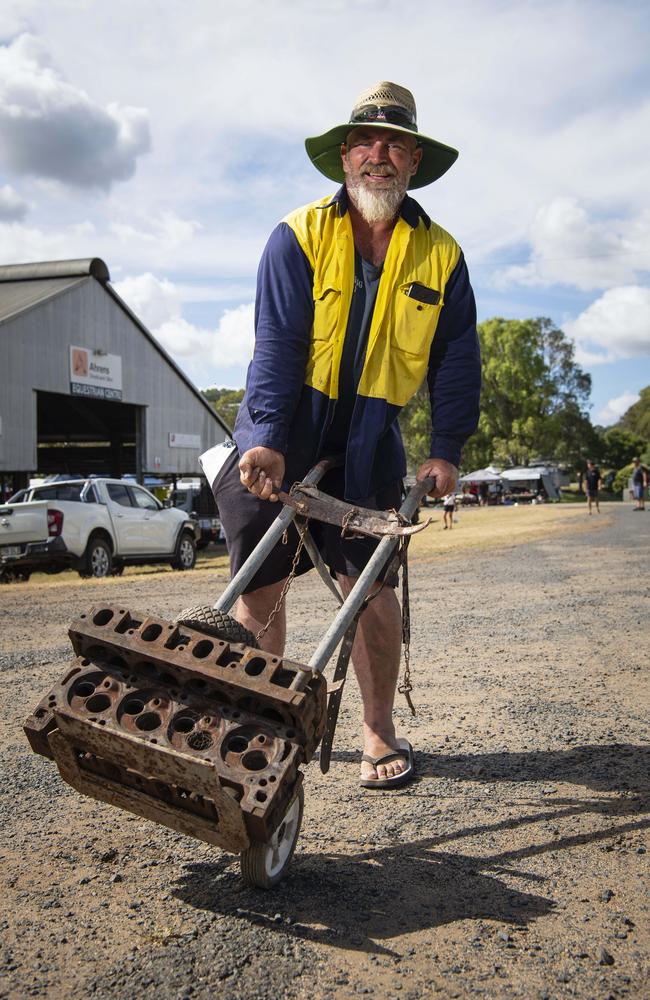 Les Walker aka Chasin Junk bought a trolley to transport his newly acquired 351 Chevy heads that promptly blew a wheel at the Toowoomba Swap hosted by Darling Downs Veteran and Vintage Motor Club at Toowoomba Showgrounds, Saturday, February 1, 2025. Picture: Kevin Farmer