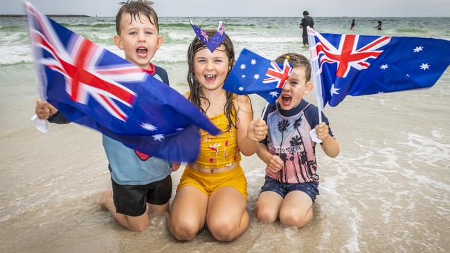 Siblings Parker, 5, Olivia, 7 and Harry, 5 get set for Australia Day on the beach. Picture: Jake Nowakowski