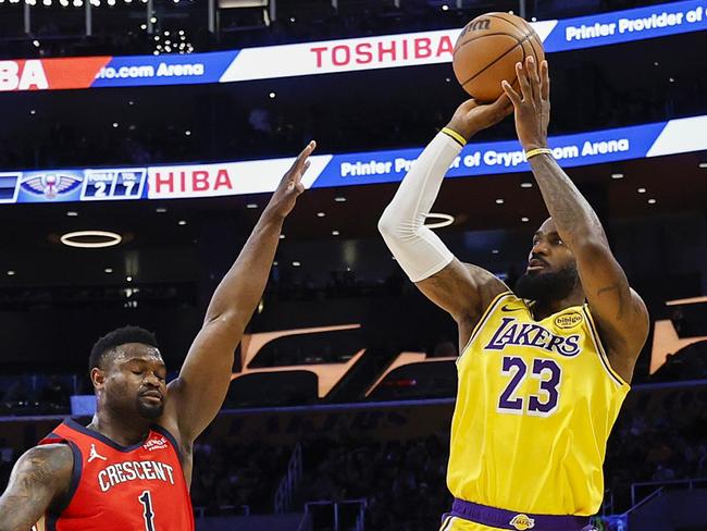 *** BESTPIX *** LOS ANGELES, CALIFORNIA - MARCH 04: LeBron James #23 of the Los Angeles Lakers shoots a 3-point basket to score his 50,002   NBA regular season and playoff career points during the first half against Zion Williamson #1 of the New Orleans Pelicans at Crypto.com Arena on March 04, 2025 in Los Angeles, California. NOTE TO USER: User expressly acknowledges and agrees that, by downloading and or using this photograph, User is consenting to the terms and conditions of the Getty Images License Agreement. (Photo by Ronald Martinez/Getty Images)