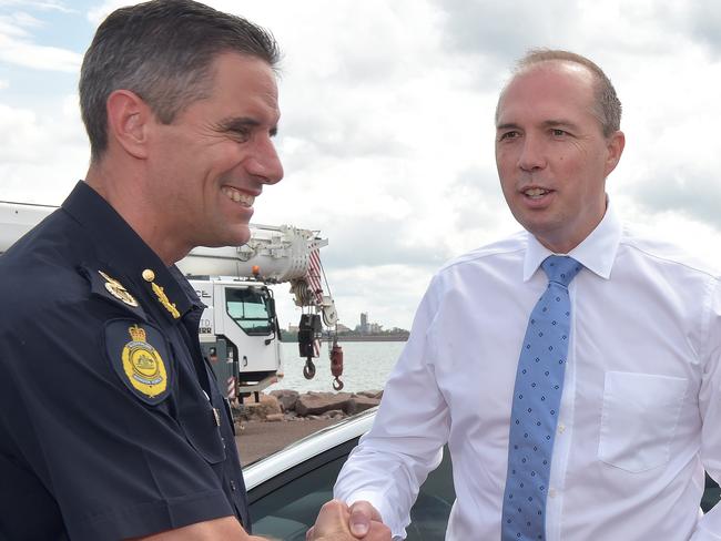 Mr Quaedvlieg, pictured with Immigration Minister Peter Dutton, has headed ABF since 2015.