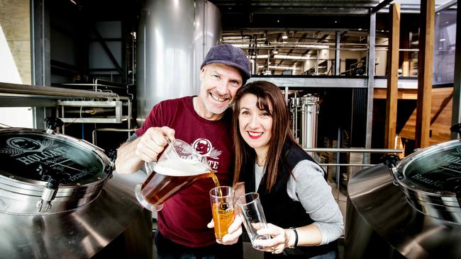 Paul and Natasha Holgate have a new taproom and brewing tanks at their historic Woodend Pub. Picture: Nicole Cleary