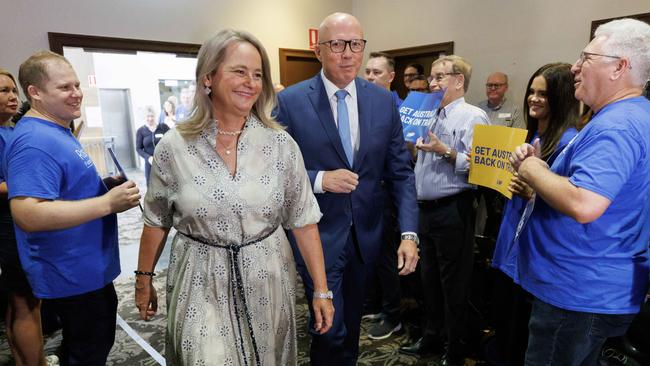 Leader of the Opposition Peter Dutton arrives at Arana Leagues Club with wife Kirilly on Sunday. Picture Lachie Millard