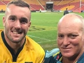 Supplied image of Izack Rodda and his dad Jon at Suncorp Stadium