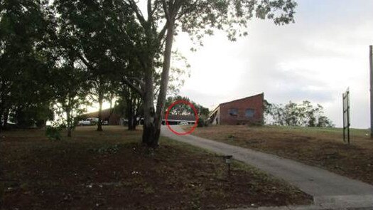 Pictures submitted in court by the Toowoomba Regional Council, which shows officers photographing Grant Forde's parent's house and his car out the front of it.