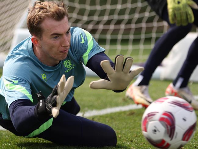 DOHA, QATAR - JANUARY 29: Australian goalkeeper Joe Gauci makes a save during an Australia Socceroos recovery session ahead of the the AFC Asian Cup at Qatar University Field 11 on January 29, 2024 in Doha, Qatar. (Photo by Robert Cianflone/Getty Images)