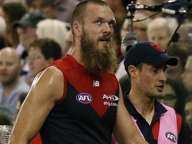 AFL Geelong Cats vs. Melbourne (ES) (T) Max Gawn walks towards the bench  after injuring his leg 2nd term Picture:Wayne Ludbey