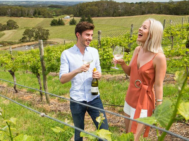 L-R Grace Whyatt and James Lockwood enjoy chardonnay at Pike and Joyce winery in Lenswood SA. Story on Resurgence of Chardonnay among the hip drinking set.