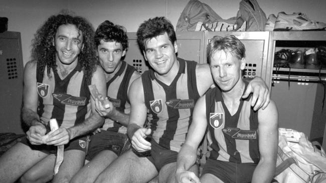 John Platten, Dean Anderson, Jason Dunstall and Andy Collins after the Hawthorn great had kicked 17 goals against Richmond at Waverley Park.