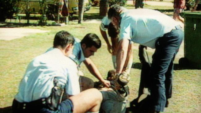 Emergency services look after an injured man following a shooting at Tugun in 1996. Picture: Channel 9