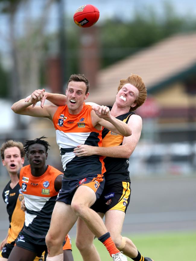 GFL: Geelong West Giants v Grovedale. Geelong West's Jayden Symes and Grovedale's Jason Gniel. Picture: Mike Dugdale