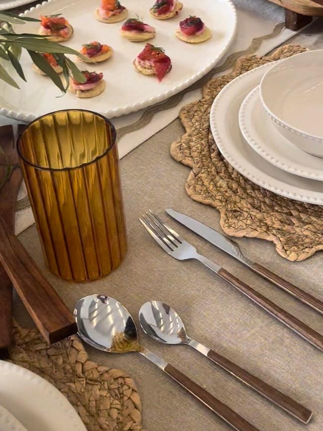 The ribbed, colour glassware makes neutral items pop on the table. Picture: News.com.au/Claudia Poposki