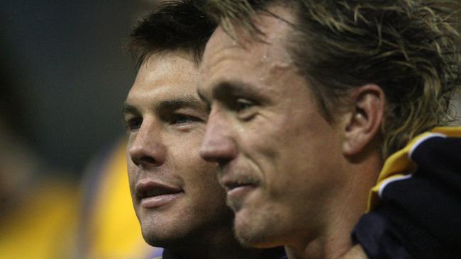 Teammates Ben Cousins and Daniel Chick celebrate.