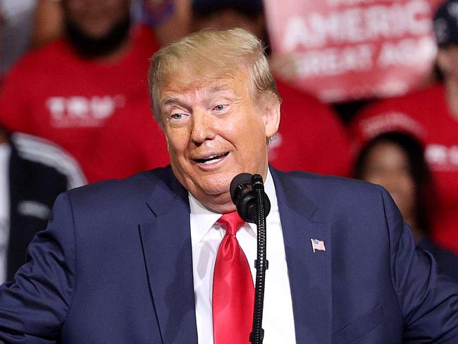 TULSA, OKLAHOMA - JUNE 20: U.S. President Donald Trump speaks at a campaign rally at the BOK Center, June 20, 2020 in Tulsa, Oklahoma. Trump is holding his first political rally since the start of the coronavirus pandemic at the BOK Center today while infection rates in the state of Oklahoma continue to rise.   Win McNamee/Getty Images/AFP == FOR NEWSPAPERS, INTERNET, TELCOS & TELEVISION USE ONLY ==