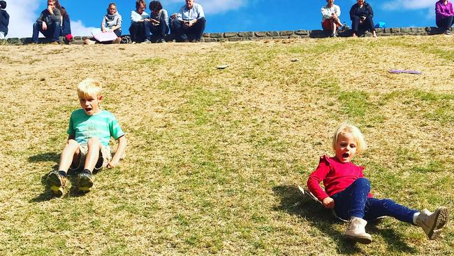 Sliding down the hill at the Mount Lofty Botanic Garden