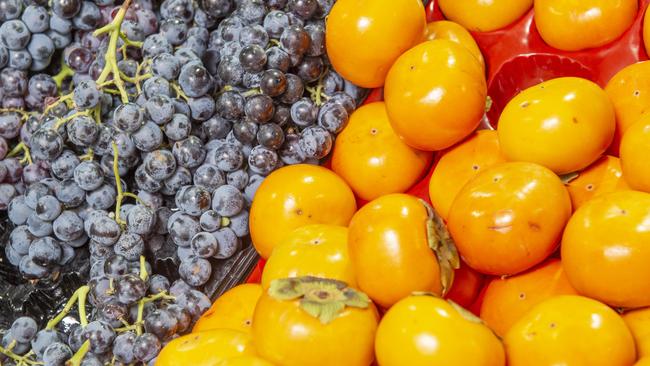 Grapes and persimmons. Picture: Rob Leeson.