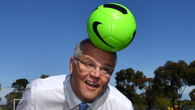 Head of State: Prime Minister Scott Morrison plays some football at Manson Park in Bellevue Heights near Adelaide