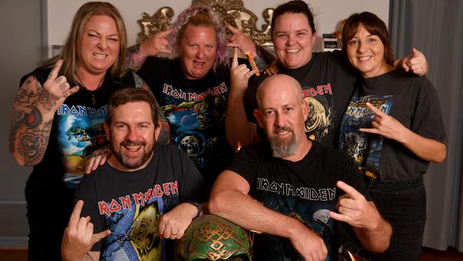 Chris Irvine and Arik Anidjar (front) with Trish Irvine, Rebekah Bennett, Kylie Berry-Porter and Jess Gorman are part of the FB group Bring Iron Maiden To Townsville. Picture: Evan Morgan