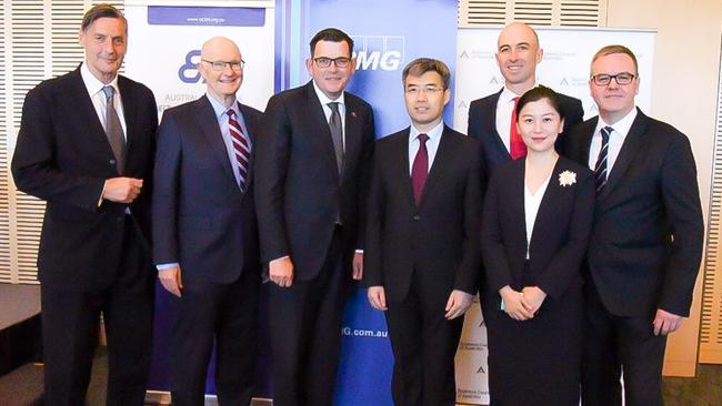 Daniel Andrews, left, with consultant Jean Dong, right, at an ACBRI event in Victoria.