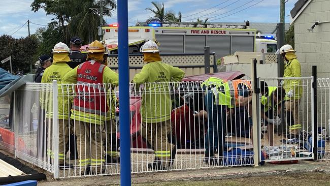 Emergency services were called to the Tropic Coast Motel along Nebo Rd in Mackay after a car crashed through a fence and landed in a plunge pool on November 13, 2021. Picture: Heidi Petith