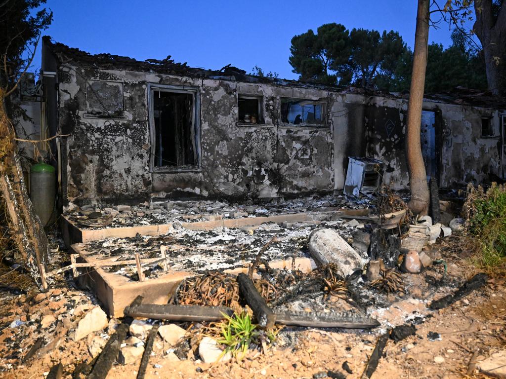 Hamas militants burned out several houses in the attack at Kibbutz Be'eri.