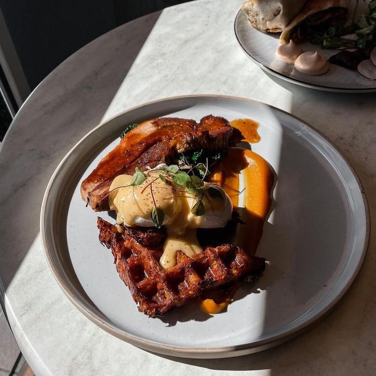 You'll find golden goodness at Huskk when you order their eggs benny. Picture: Huskk