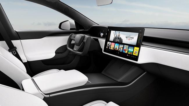 The updated Model S has a plane-like steering wheel and the central screen serves as a gaming computer.