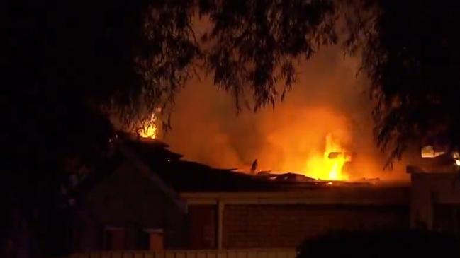 A mum and son have lost everything in a house fire at Holden Hill. Picture: 7NEWS