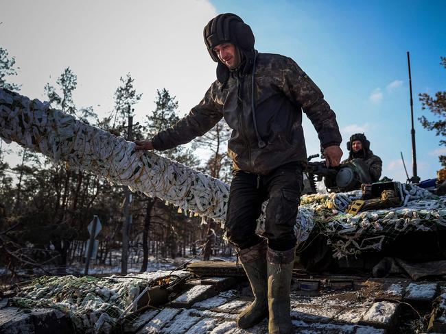 Members of a Ukrainian tank crew prepare for an operation in the Donetsk region. Picture: AFP