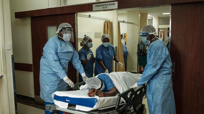 A nurse plays a patient in a drill to test capabilities for a Covid-19 influx at the Aga Khan University Hospital in Nairobi, Kenya. Picture: AFP