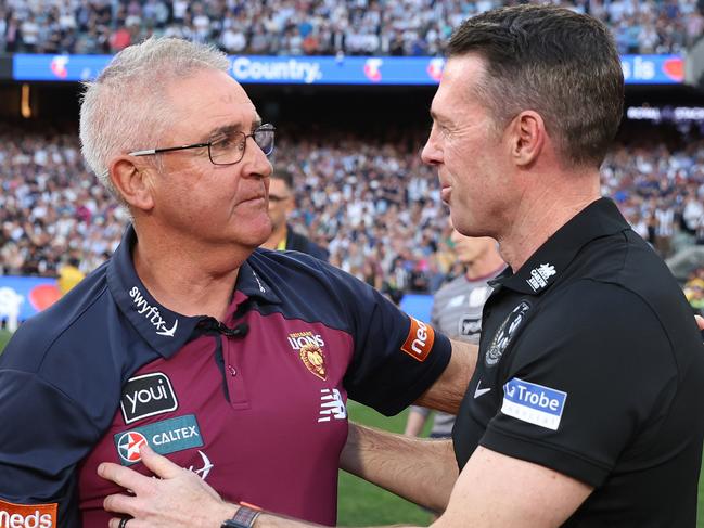 MELBOURNE, AUSTRALIA - SEPTEMBER 30: Lions coach Chris Fagan is acknowledged by Magpies coach Craig McRae during the 2023 AFL Grand Final match between Collingwood Magpies and Brisbane Lions at Melbourne Cricket Ground, on September 30, 2023, in Melbourne, Australia. (Photo by Robert Cianflone/AFL Photos/via Getty Images)