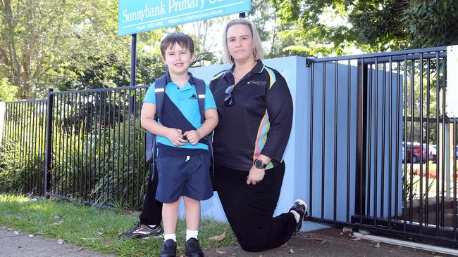 Dana Vukovic and her son Lex Lutherborrow at Sunnybank State School. Picture: AAP Image/Richard Gosling