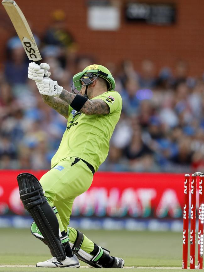 The Thunder’s Alex Hales is bowled by Billy Stanlake in the New Year’s Eve clash at Adelaide Oval. Picture: Kelly Barnes (AAP)