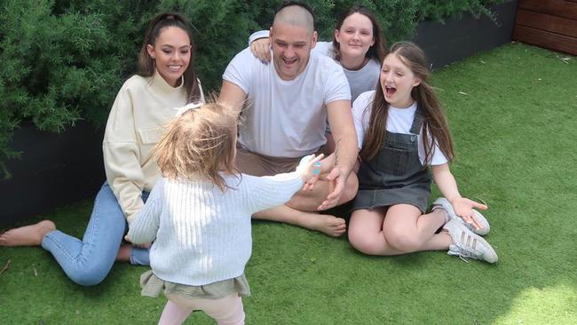 Tobi Fevola rejoins the family circle … with Brendan, Mia, Leni, and Lulu. Picture: Alex Fevola