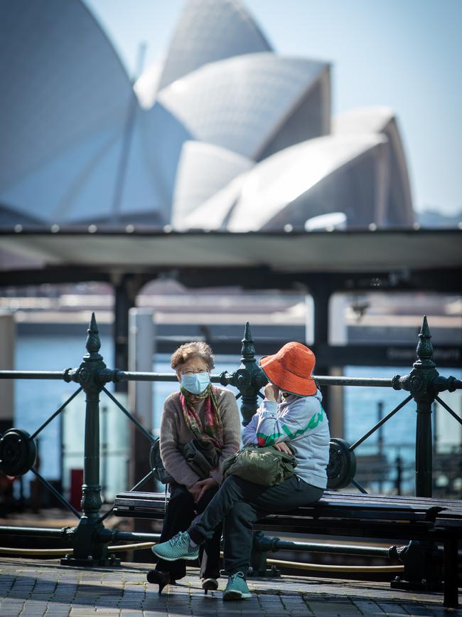 Many who did venture out chose to wear face masks. Pictures: Julian Andrews