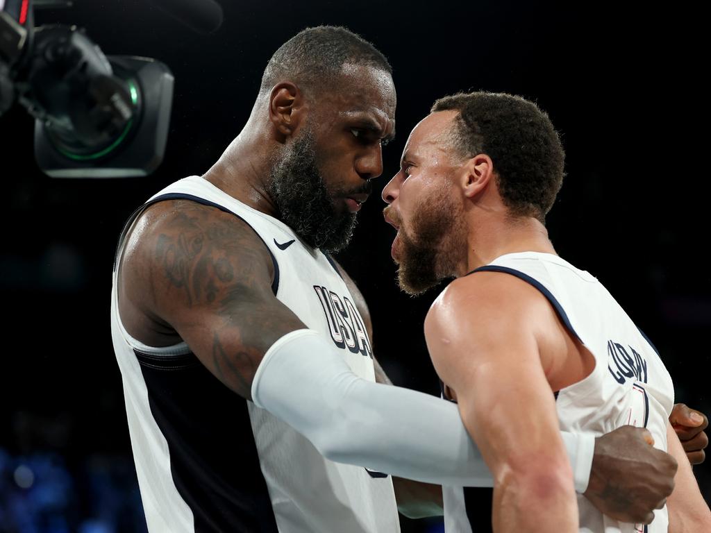 LeBron James and Steph Curry celebrate as they beat Serbia. Picture: Gregory Shamus/Getty Images