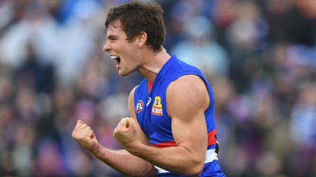 Josh Dunkley of the Bulldogs reacts after kicking a goal during the Round 8 AFL match between the Western Bulldogs and the Brisbane Lions at Mars Stadium in Ballarat, Saturday, May 11, 2019.  (AAP Image/Julian Smith) NO ARCHIVING, EDITORIAL USE ONLY