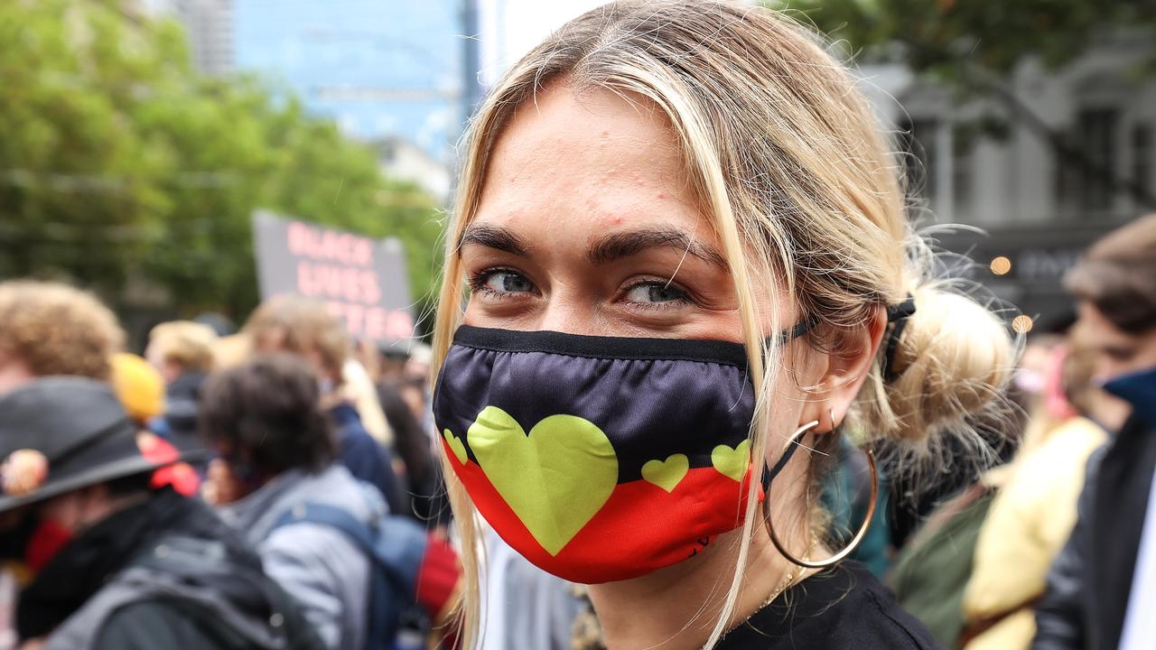 Huge crowds walk down Bourke Street Melbourne at 2021’s Invasion Day Rally. Picture : NCA NewsWire / Ian Currie