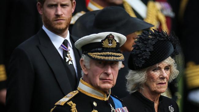 King Charles III, Camilla, Queen Consort and Prince Harry with Meghan Markle. Picture: AFP