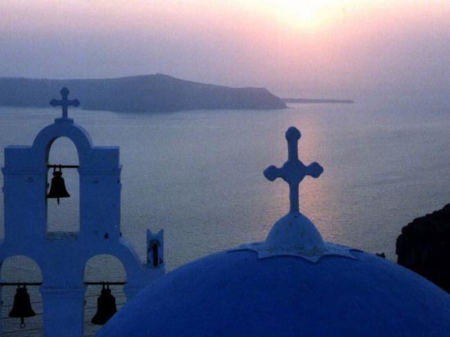 Undated. Sunset on island of Santorini. Greece. Greek Islands. Travel.