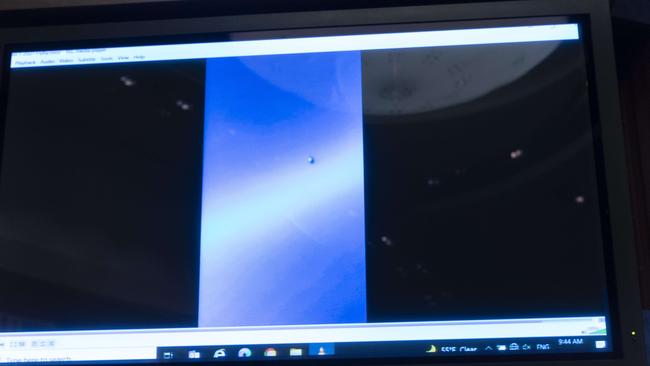 A video of unidentified aerial phenomena is played to the House Intelligence Committee subcommittee hearing. Picture: Getty Images/AFP.