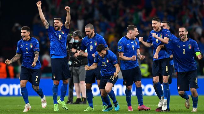 Italys celebrate following their team's victory in the penalty shoot out.