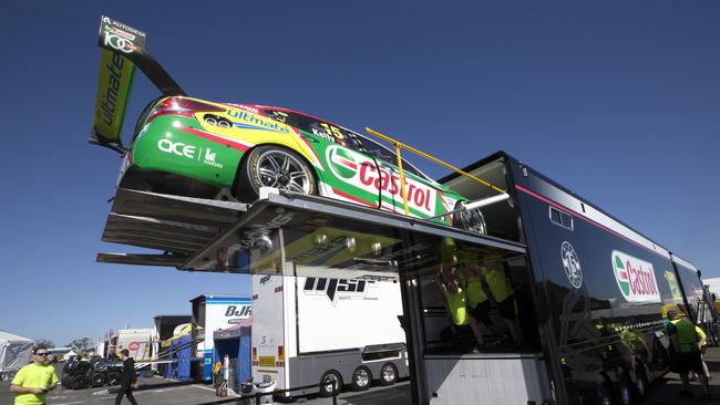 Rick Kelly's Supercar is unloaded at Symmons Plains. Picture: CHRIS KIDD