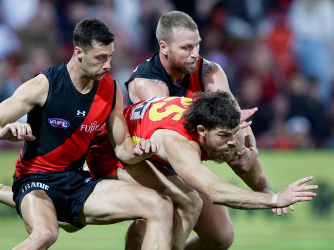 Sam Collins held Essendon danger man Kyle Langford goalless in the Suns’ 11-point win over the Bombers last weekend. (Photo by Russell Freeman/AFL Photos via Getty Images)