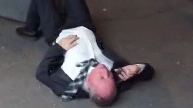 Barnaby Joyce swearing into his mobile phone as he lay on the ground. This attracted more attention than changes to stage three tax cuts. Picture: X