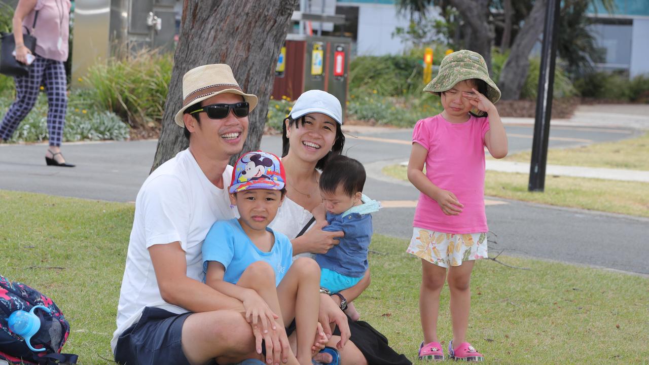 Faces of the Gold Coast, at Broadbeach. Thye and Eunice Gan with their children at the park. Picture Glenn Hampson