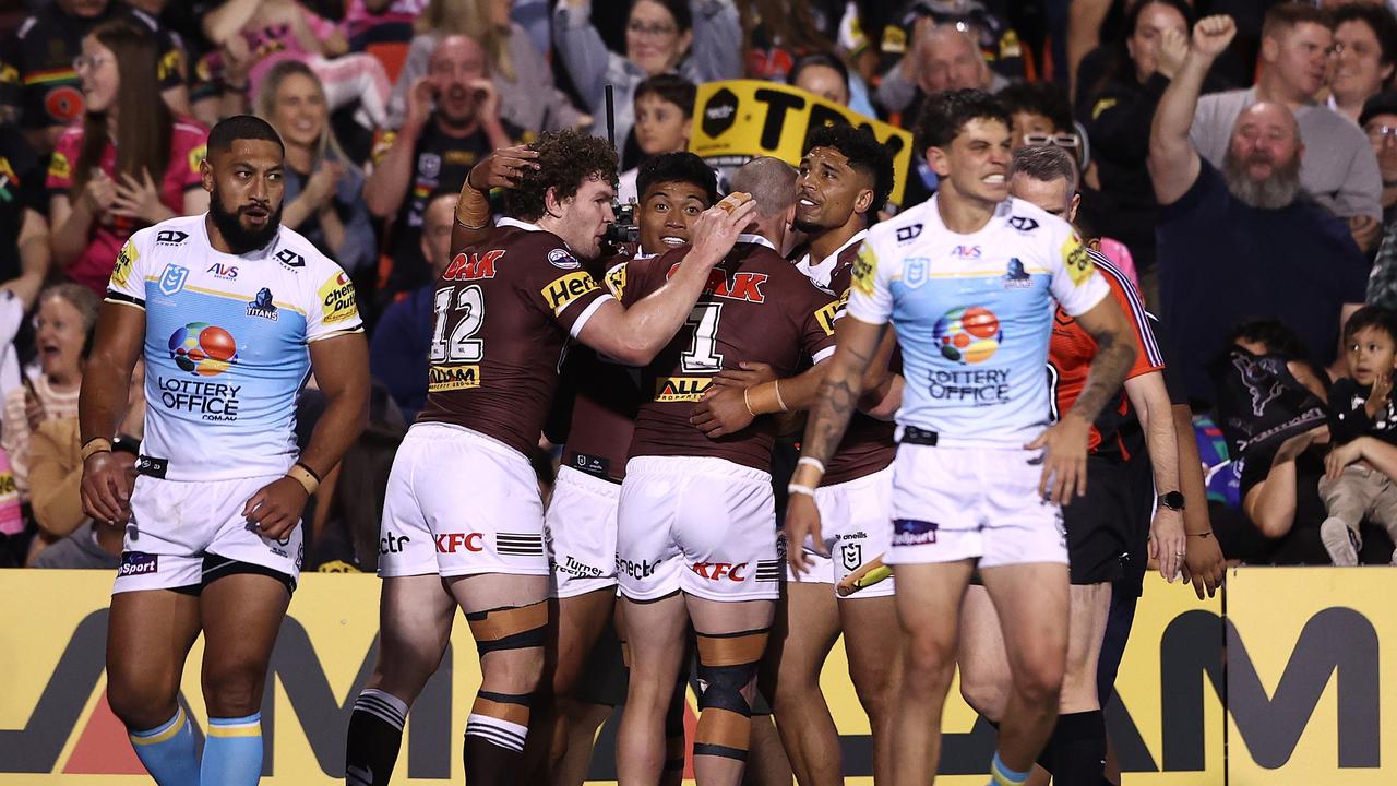 PENRITH, AUSTRALIA - SEPTEMBER 07: Brian To'o of the Panthers celebrates with team mates after scoring a try during the round 27 NRL match between Penrith Panthers and Gold Coast Titans at BlueBet Stadium on September 07, 2024, in Penrith, Australia. (Photo by Matt Blyth/Getty Images)