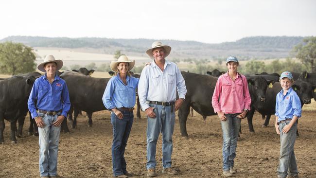 Many hands: Farming is a family affair for Ben and Wendy Mayne of Texas Angus (left) and (right) with their children Will, 14, Rosie, 16, and Lachie, 12. Picture: Rachel Sherman